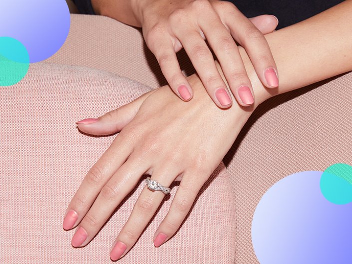 hands with nails painted pink