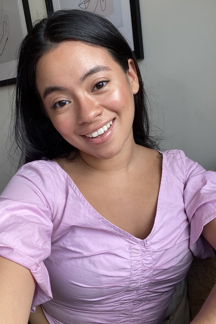 person wearing lip gloss