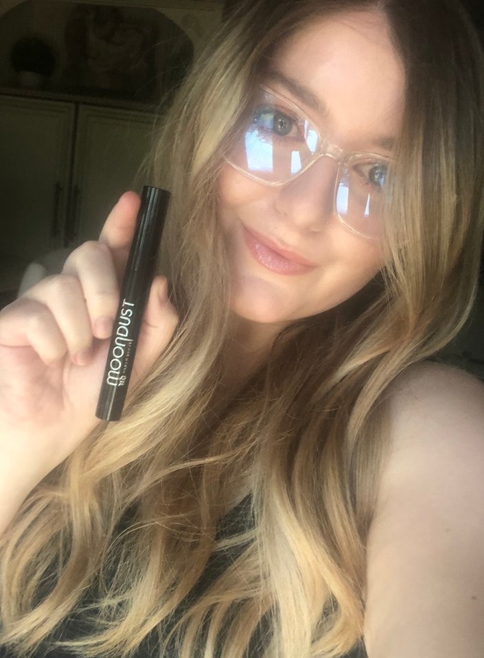 person posing with urban decay moondust lip eclipse