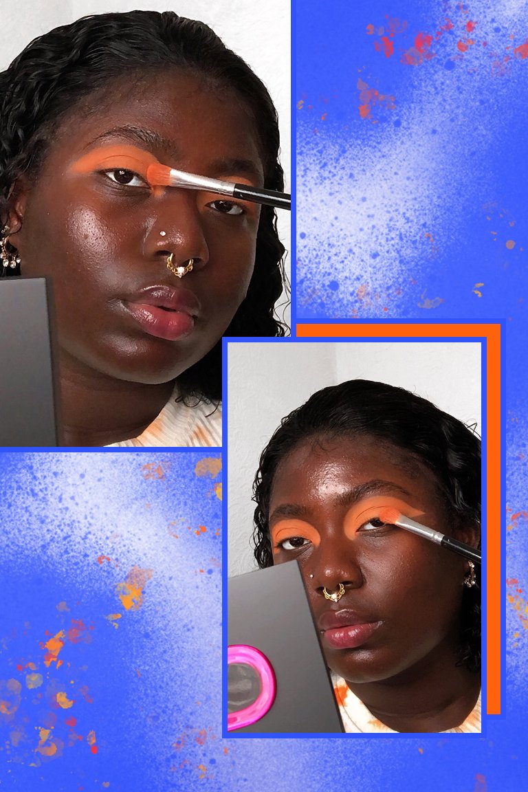 person applying orange eyeshadow to eyelids