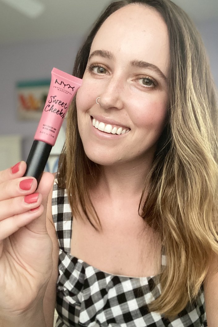 person wearing nyx professional makeup sweet cheeks lip and cheek tint in baby doll