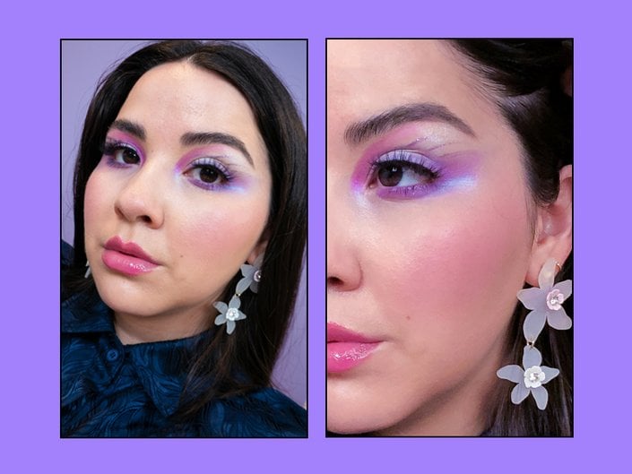 person wearing violet and glitter eye makeup