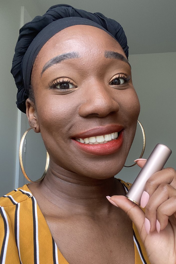 person wearing Lancôme L’Absolu Rouge Intimatte Lipstick in Pleasure First