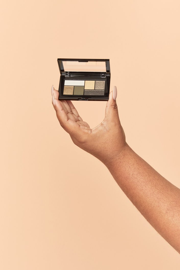 hand holding eyeshadow palette
