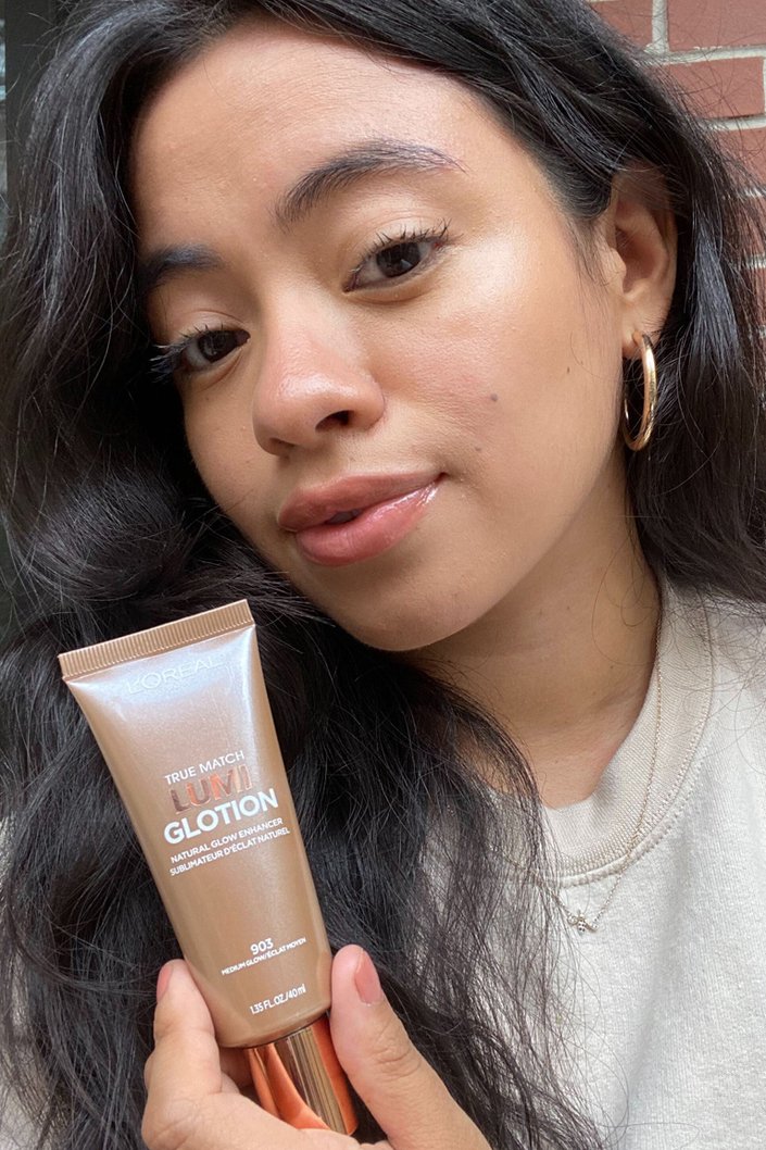 person wearing L’Oréal Paris True Match Lumi Glotion