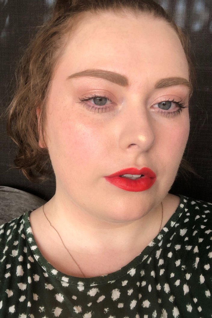 person wearing Maybelline Tattoo Studio Brow Pomade in Light Blonde