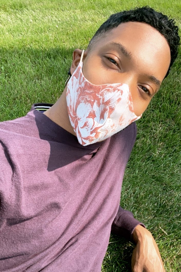 person wearing a protective face mask