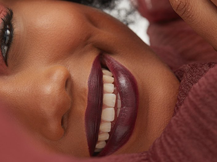 person wearing burgundy lipstick