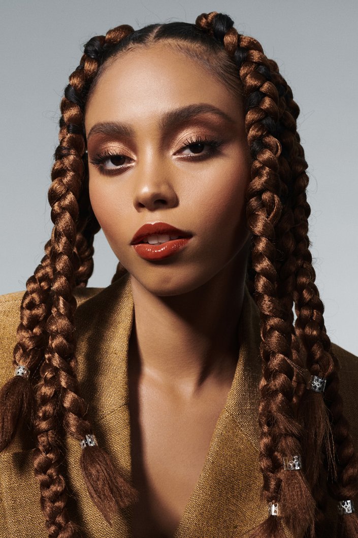 person wearing copper eyeshadow and lipstick