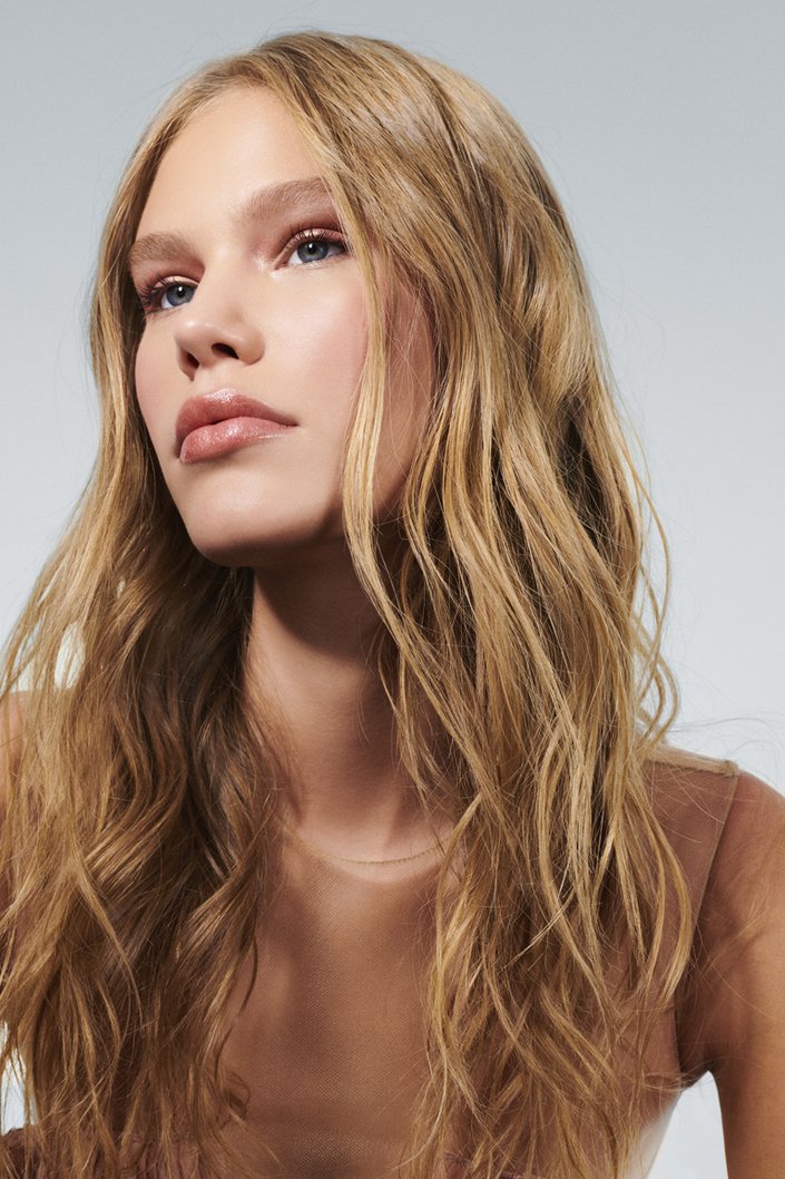 person wearing nude makeup