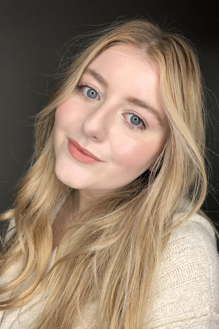 person wearing YSL Beauty Tatouage Couture Velvet Cream Liquid Lipstick in Beige Underground