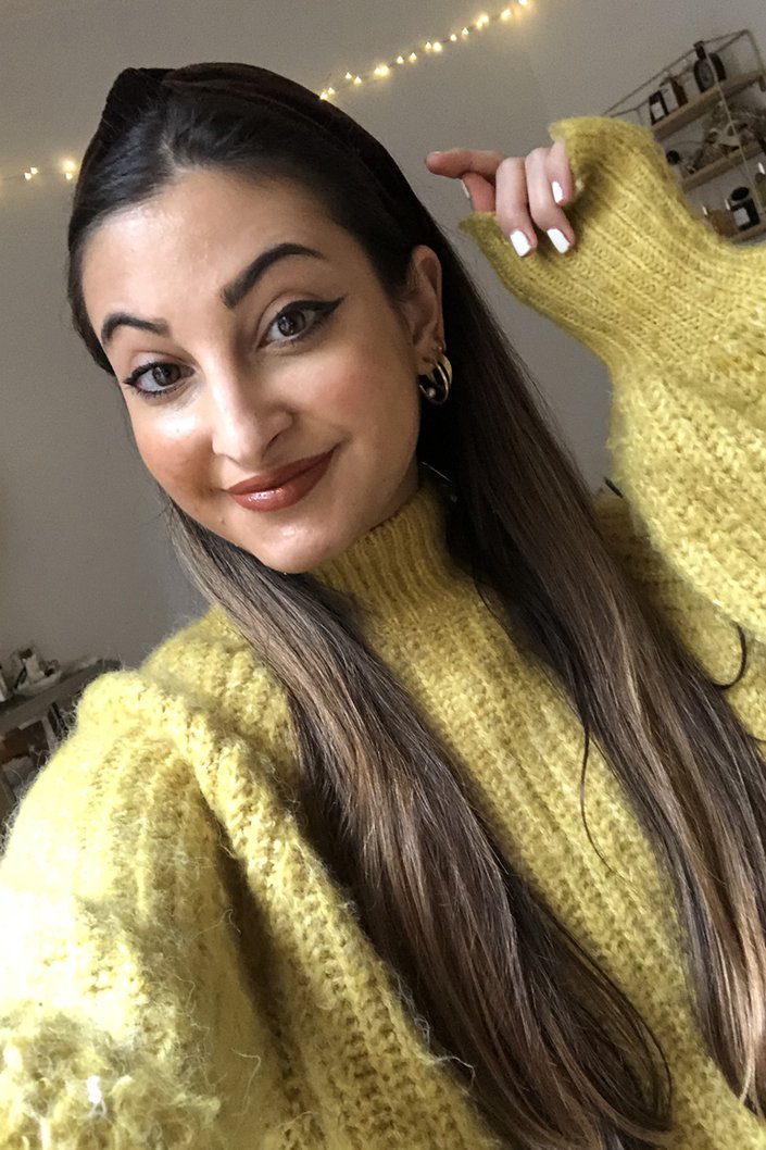 person wearing Maybelline New York Super Stay Matte Ink Coffee Edition In Caramel Collector