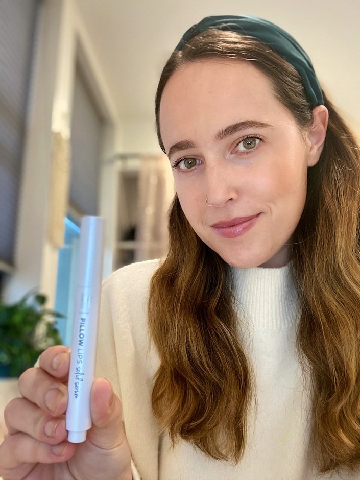 person wearing IT Cosmetics Pillow Lips Solid Serum in Like a Dream