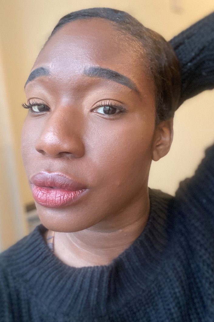 person wearing ysl slim glow matte lipstick in 205 secret rosewood