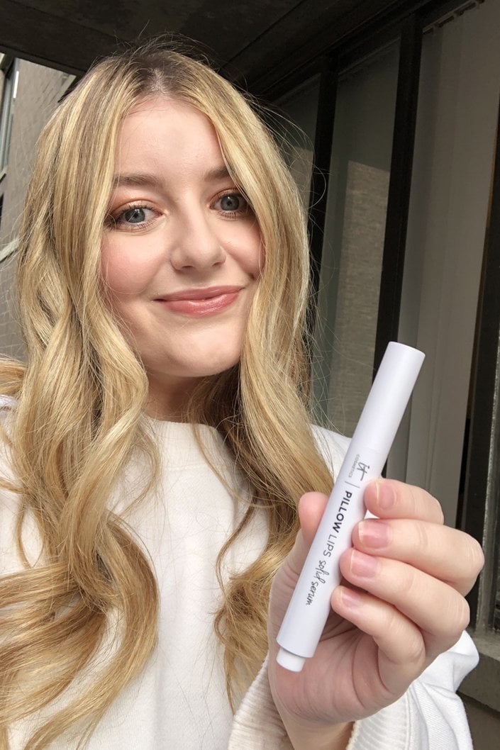person wearing IT Cosmetics Pillow Lips Solid Serum Lip Gloss in Humble