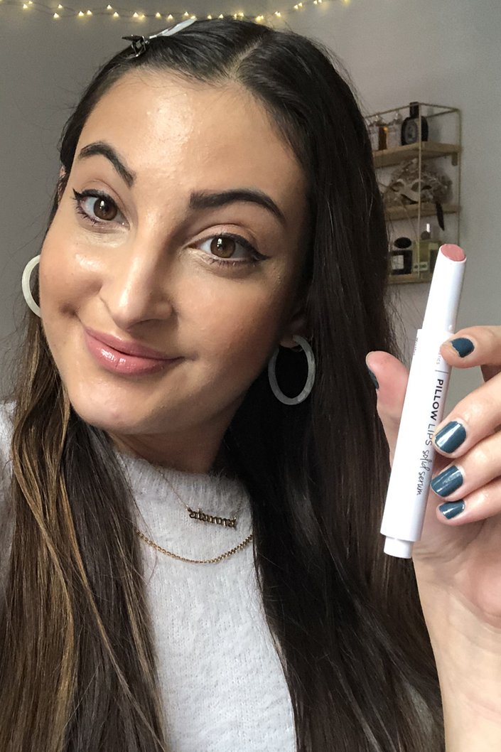 person wearing IT Cosmetics Pillow Lips Solid Serum Lip Gloss in Wistful