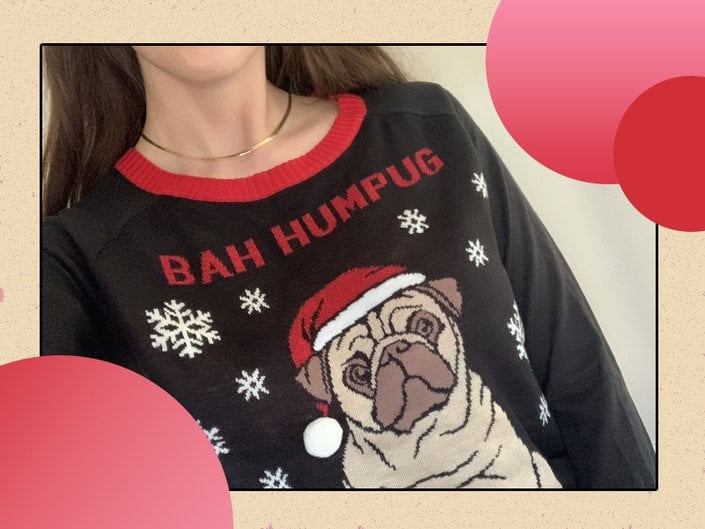 person wearing holiday sweater