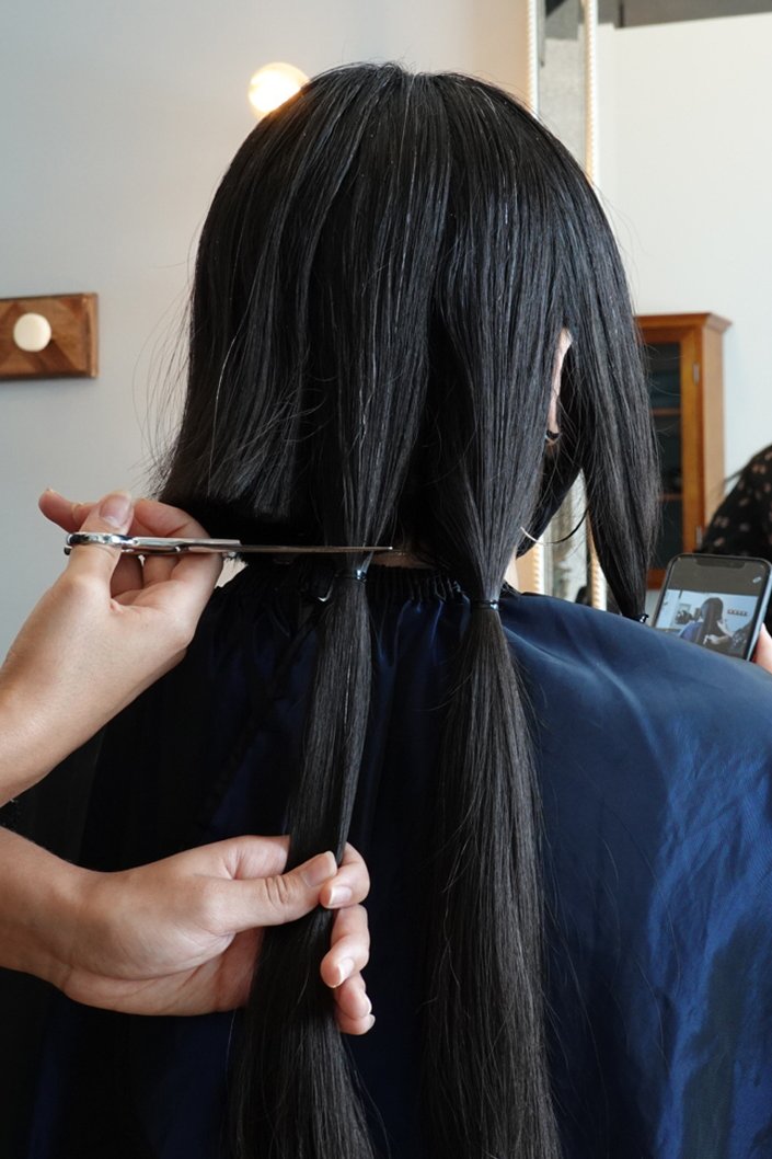 person getting a haircut