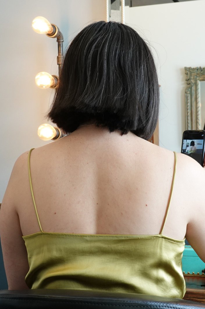 rare view of a person with a bob haircut