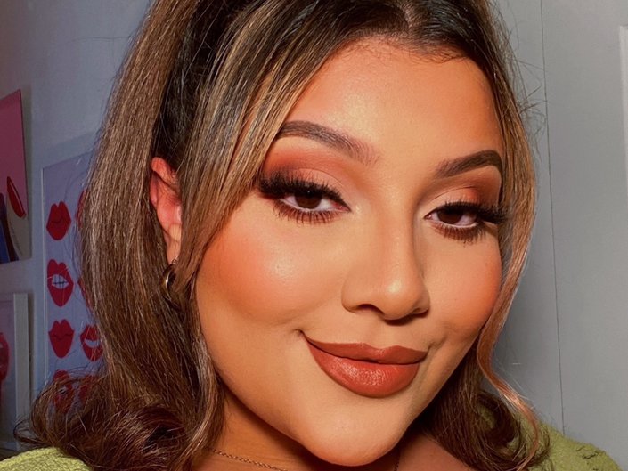 person wearing neutral matte makeup