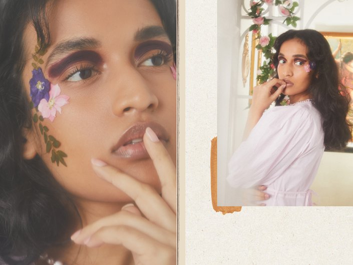 person wearing floral face makeup and violet eye makeup