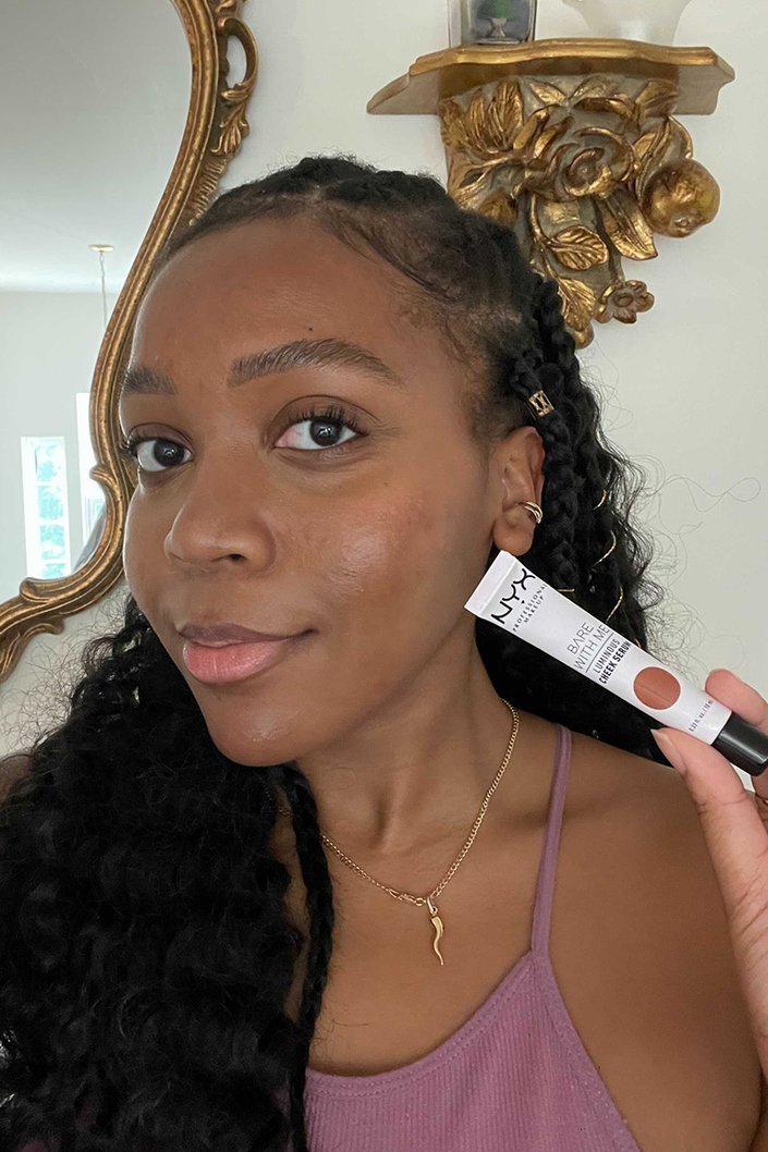 person wearing NYX Professional Makeup Luminous Cheek Serum in Sienna Bronze