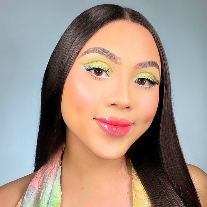 person wearing colorful eye makeup