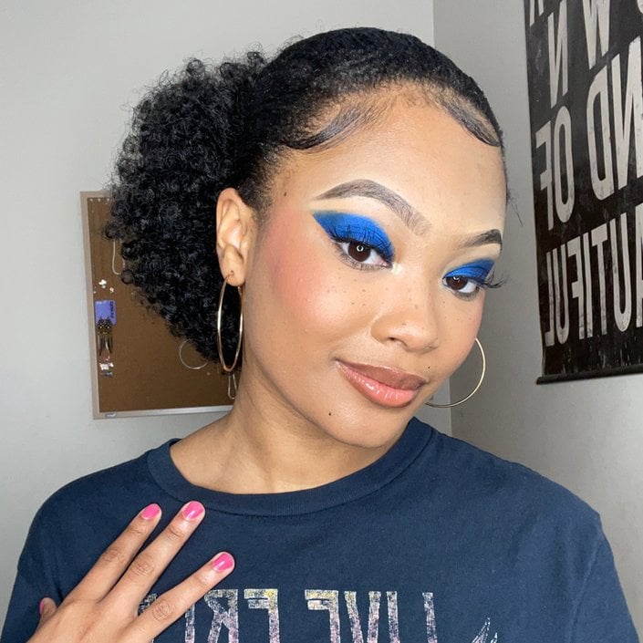 person wearing royal blue eyeshadow