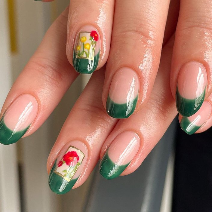 hands with green french tips on nails