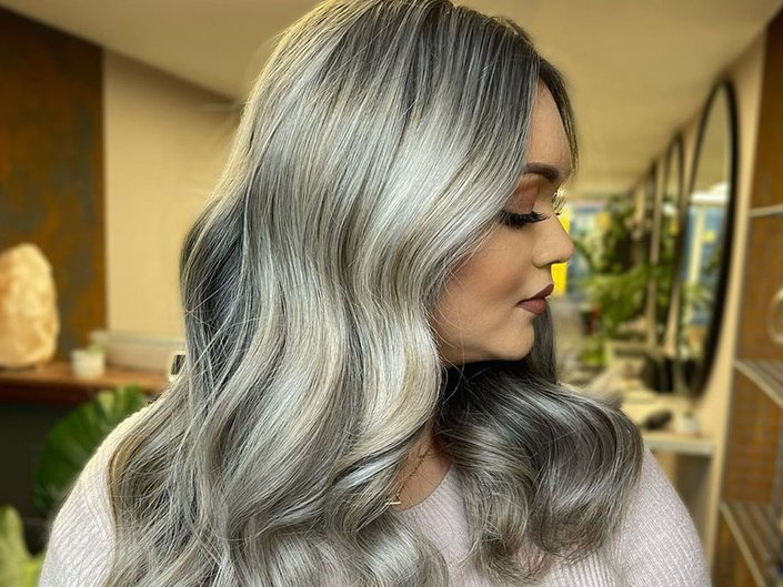 person with long silver gray hair
