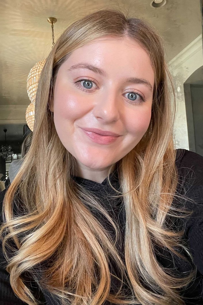 person wearing l'oreal paris skin paradise water-infused tinted moisturizer in fair 03
