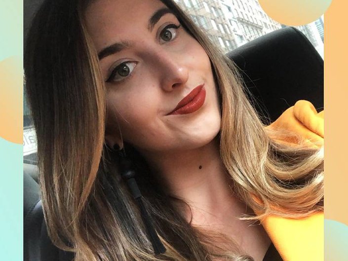 person wearing winged eyeliner and red lipstick