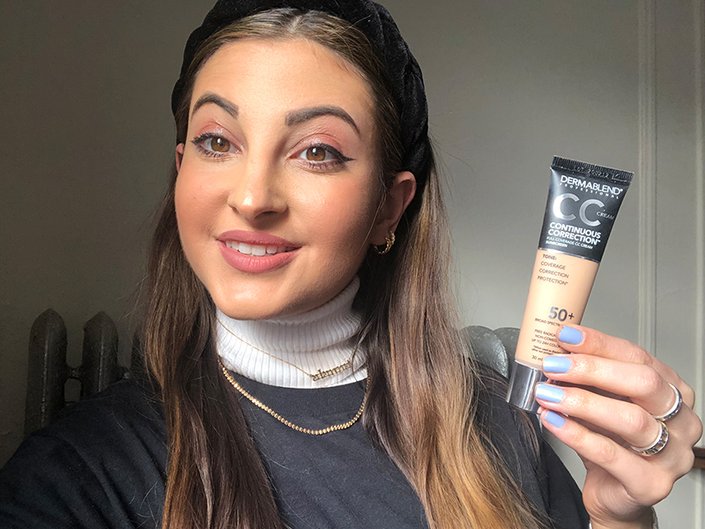 person holding dermablend continuous correction cc cream
