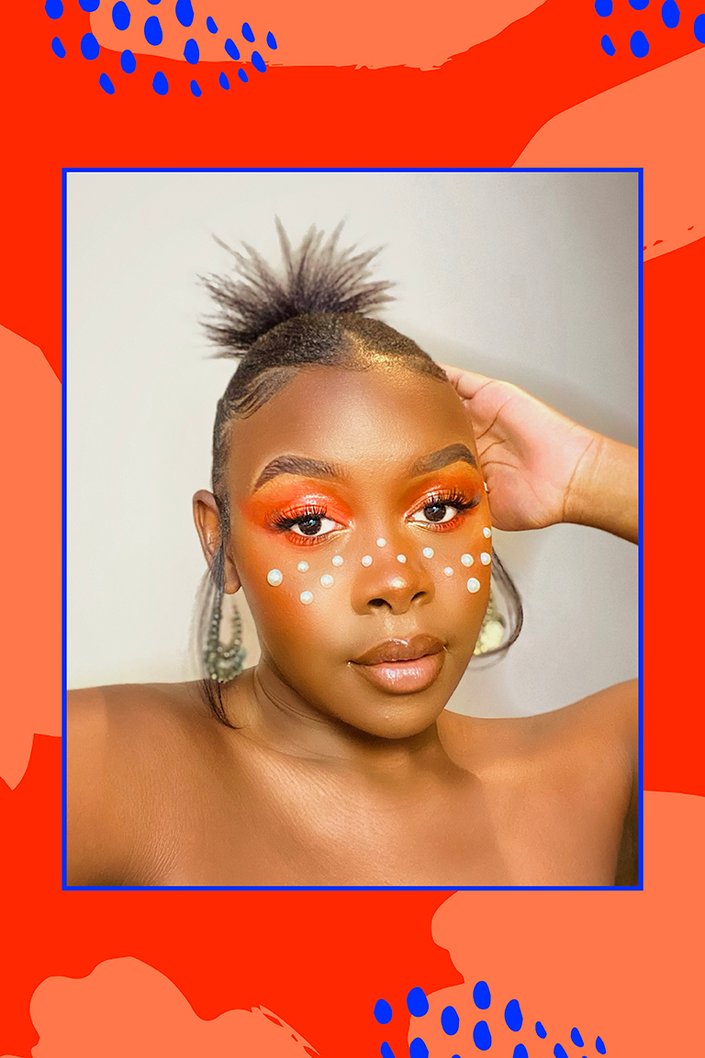 person wearing orange eye makeup with pearls on face