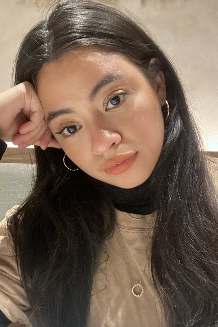 person wearing l'oreal paris les nus colour riche lipstick in nu intense