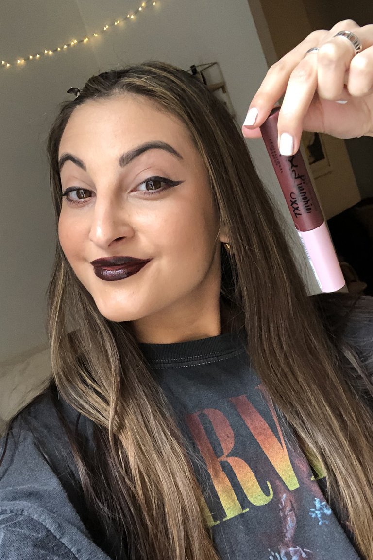 person wearing nyx professional makeup lip lingerie xxl matte liquid lipstick in deep mesh