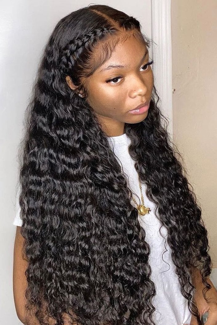 person with long wavy hair and halo braids