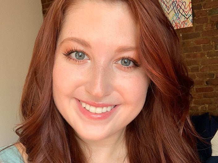 person with matching red hair and eyebrows