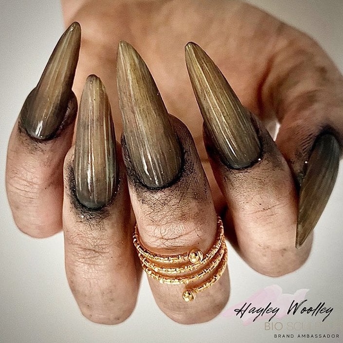 hand with long witchy nails