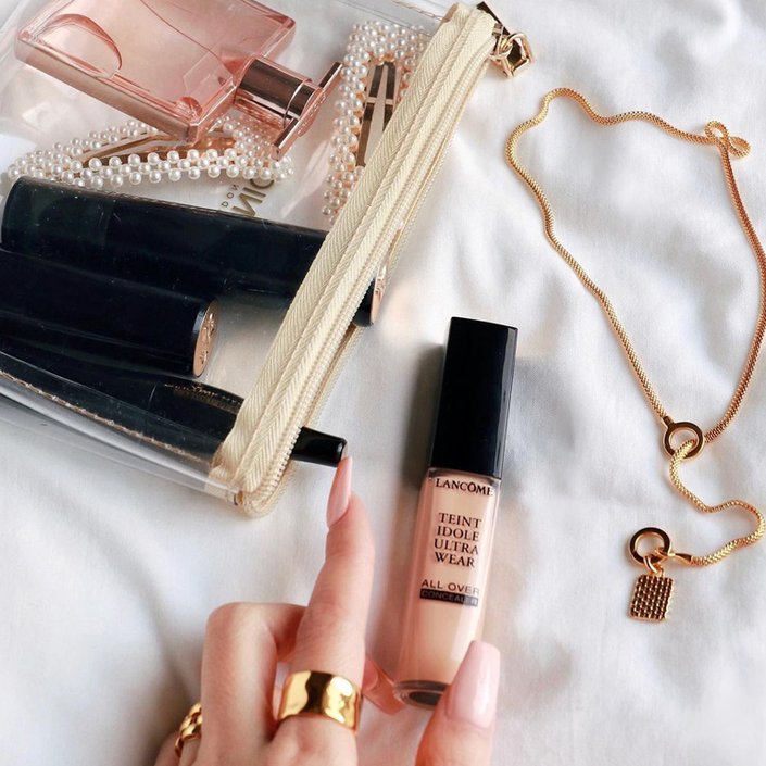 clear makeup bag with makeup products inside