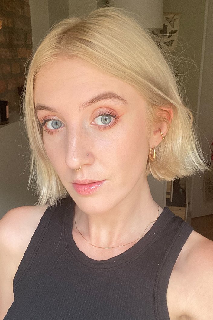 person wearing pink glitter eyeshadow