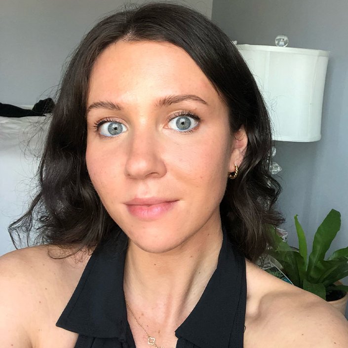 person wearing blue eyeliner