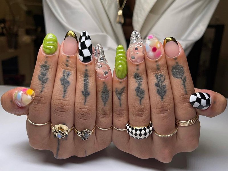 hands displaying nail art