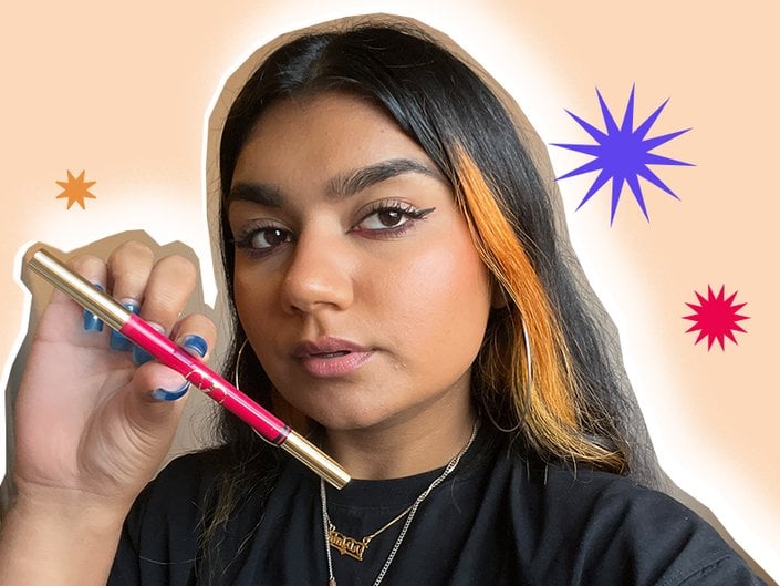 person holding valentino eyeliner