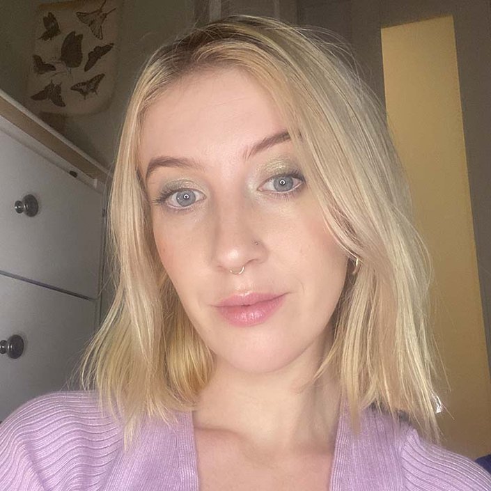 person wearing shimmery light green eyeshadow
