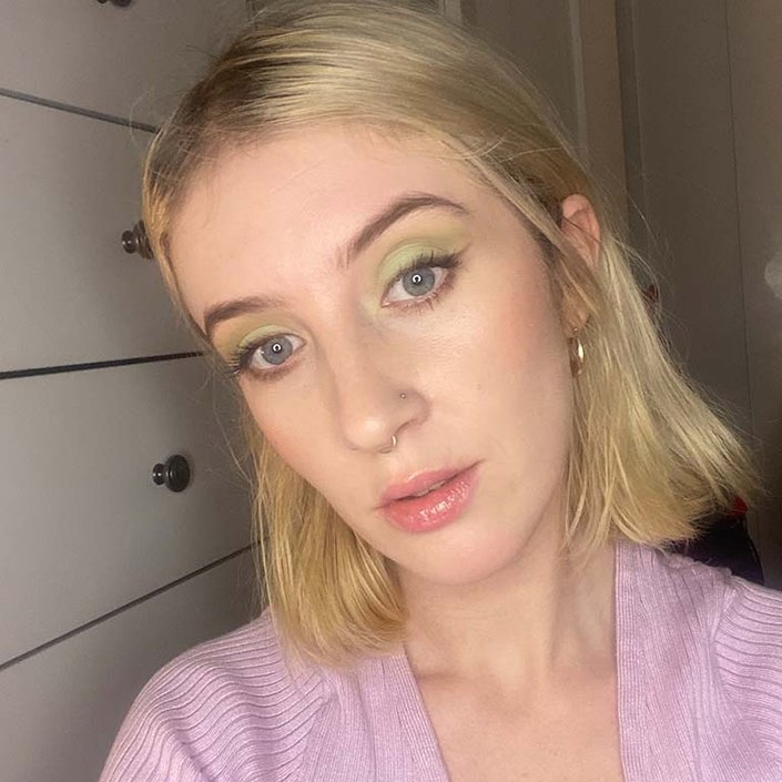 person wearing pastel green eyeshadow
