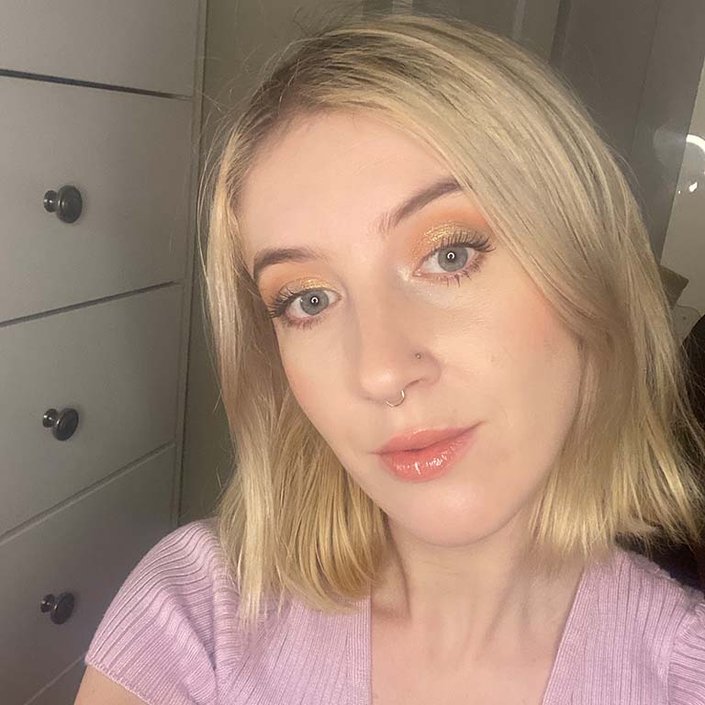 person wearing light green glitter eyeshadow