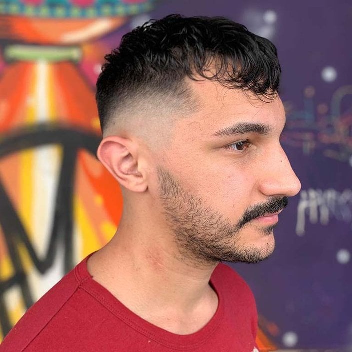 person with fade haircut