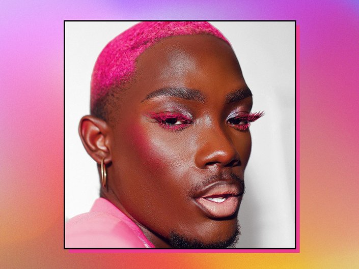 Person with pink hair and eyelashes on graphic rainbow gradient background