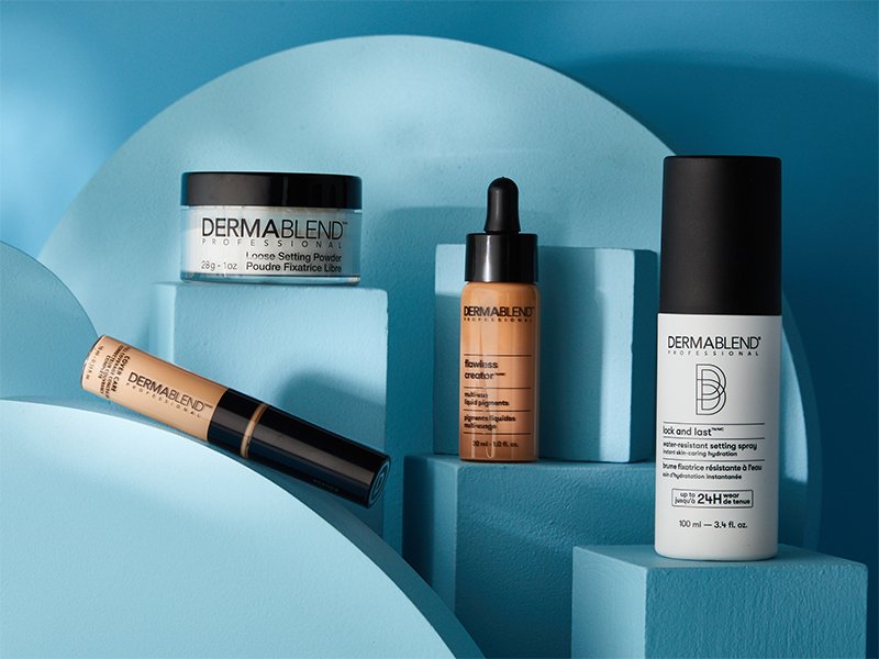 Dermablend makeup products on a blue background 